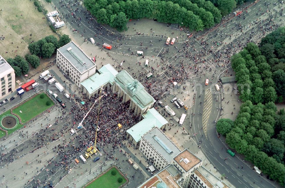 Aerial image Berlin - Participants in the Love Parade music festival on the event concert area on gate Brandenburger Tor in the district Mitte in Berlin, Germany