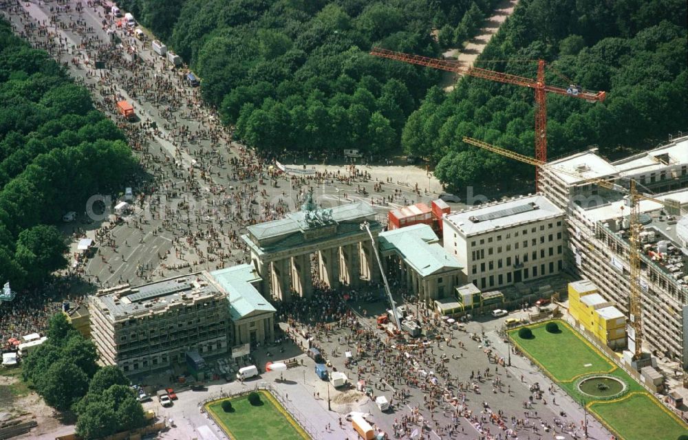 Aerial image Berlin - Participants in the Love Parade music festival on the event concert area on gate Brandenburger Tor in the district Mitte in Berlin, Germany