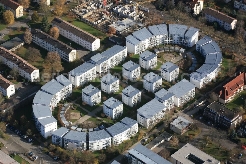 Lörrach from above - Residential development on the site of the former stadium in Loerrach in Baden-Wuerttemberg. The geometry of the stadium was maintained for the arrangement of the houses and blocks