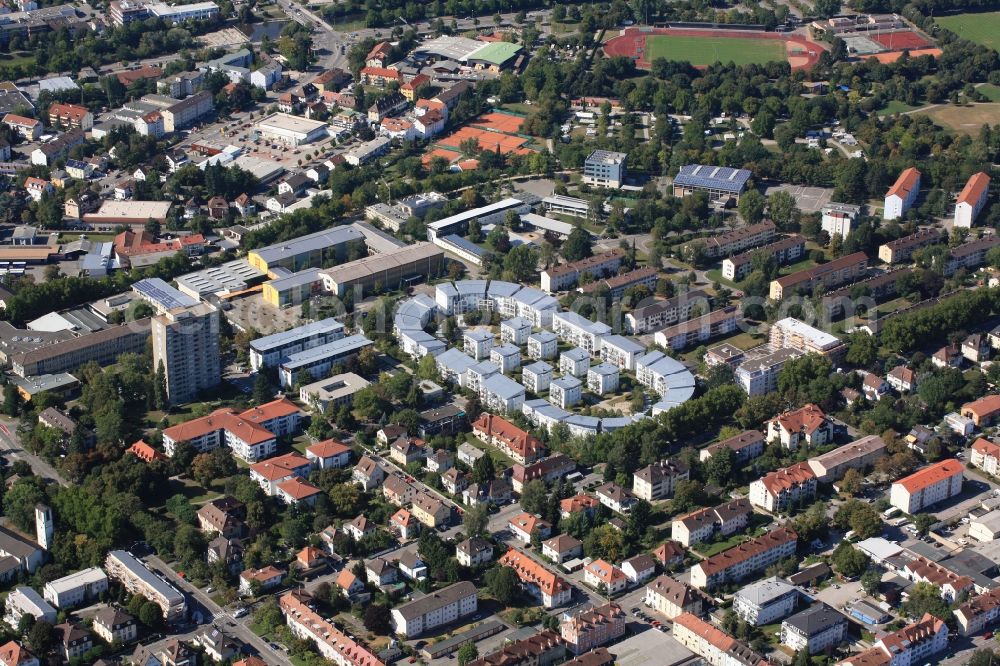 Lörrach from the bird's eye view: Residential development on the site of the former stadium in Loerrach in Baden-Wuerttemberg. The geometry of the stadium was maintained for the arrangement of the houses and blocks