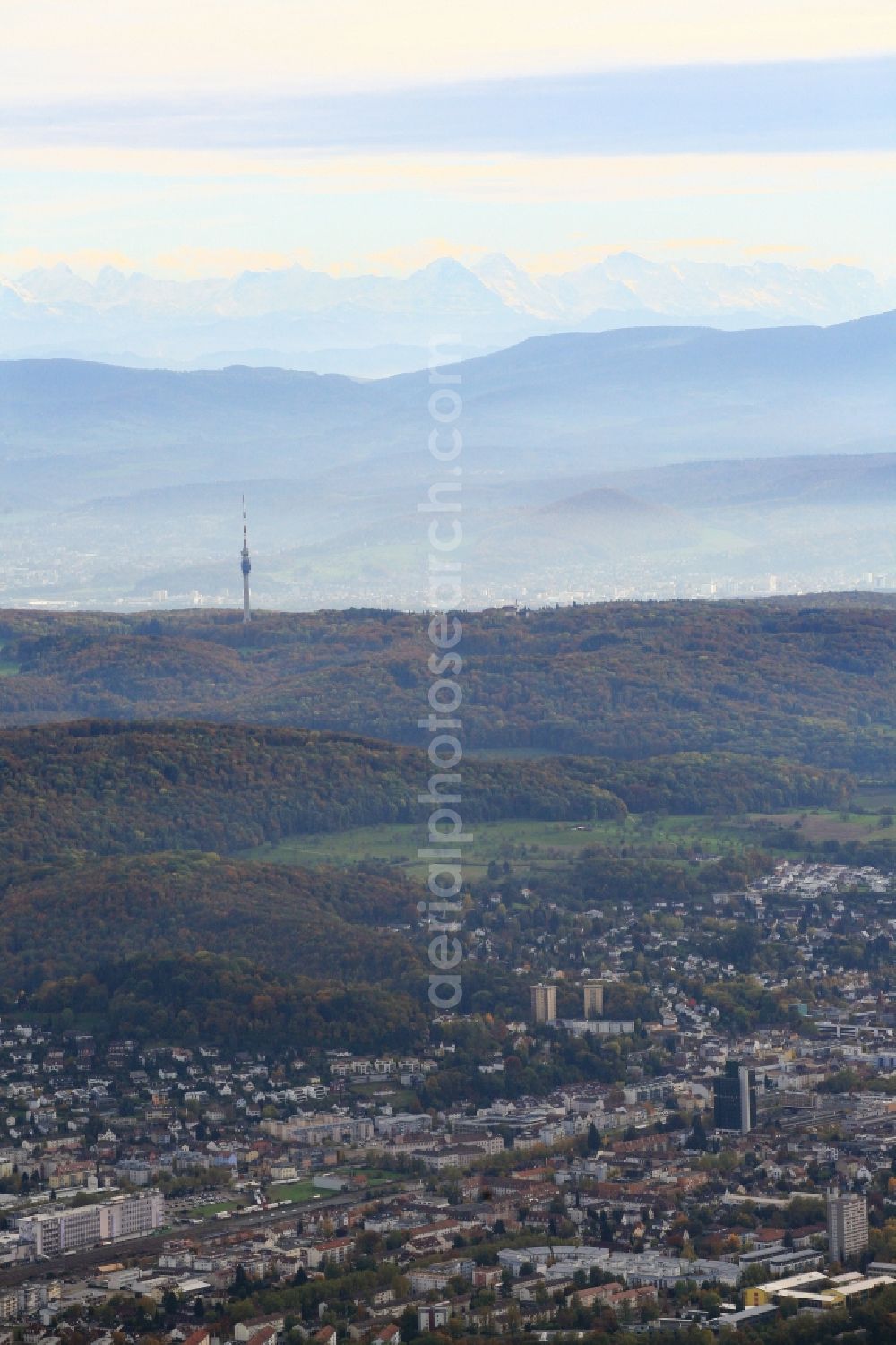 Lörrach from the bird's eye view: Loerrach in Baden-Wuerttemberg with a view over the countryside and Tower St. Chrischona in Bettingen in Switzerland up to the mountains of the Swiss Jura