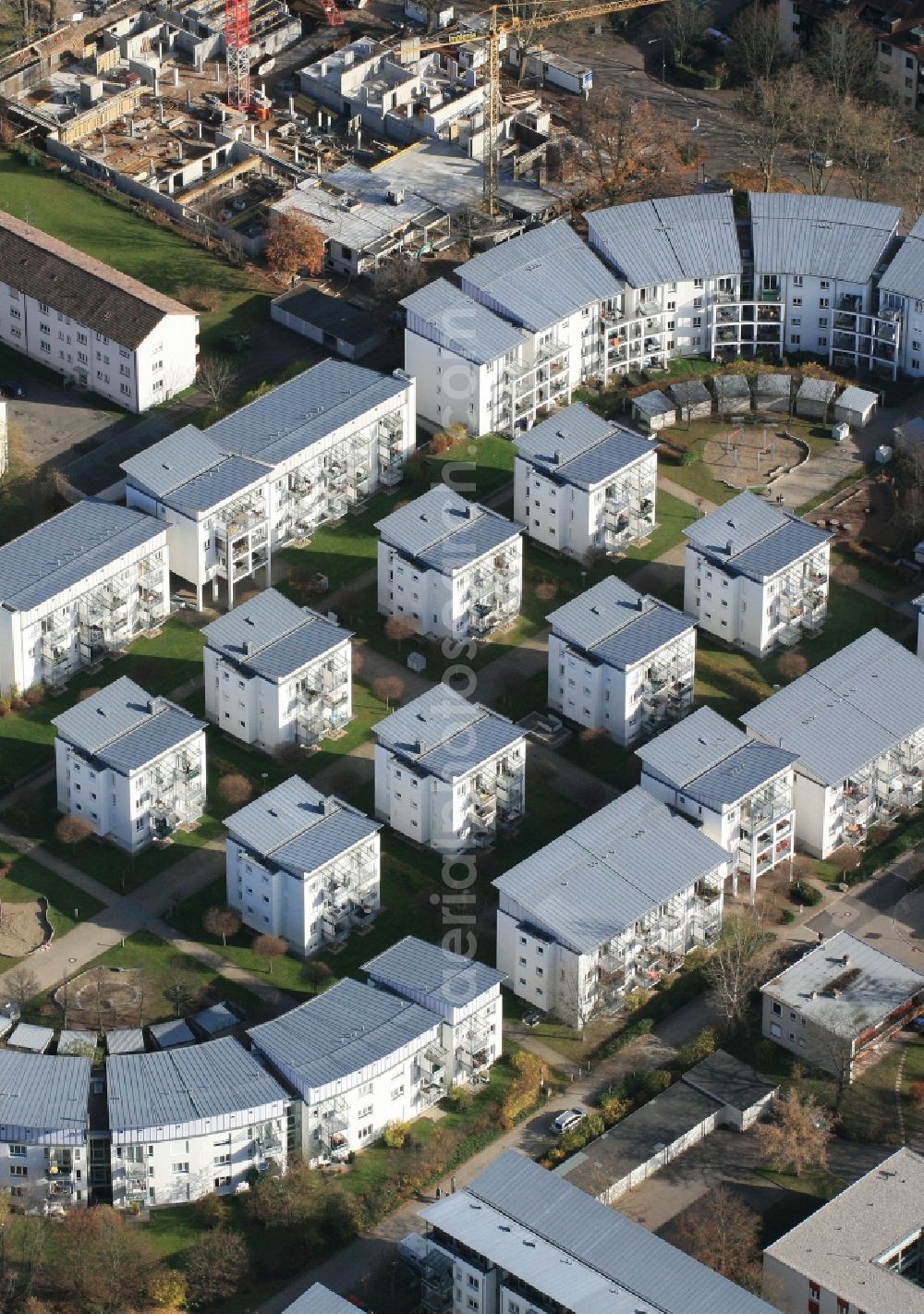 Aerial photograph Lörrach - Residential development on the site of the former stadium in Loerrach in Baden-Wuerttemberg. The geometry of the stadium was maintained for the arrangement of the houses and blocks