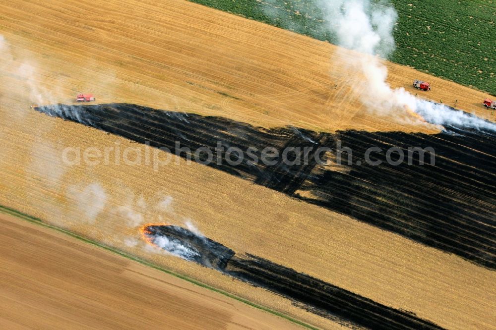 Volkenroda from above - Unloading, the fire on a controlled field - fire on an agricultural property at Volkenroda in Thuringia. Foto: Karina Hessland