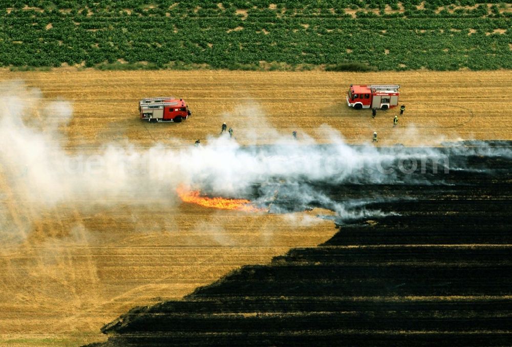 Aerial image Volkenroda - Unloading, the fire on a controlled field - fire on an agricultural property at Volkenroda in Thuringia. Foto: Karina Hessland