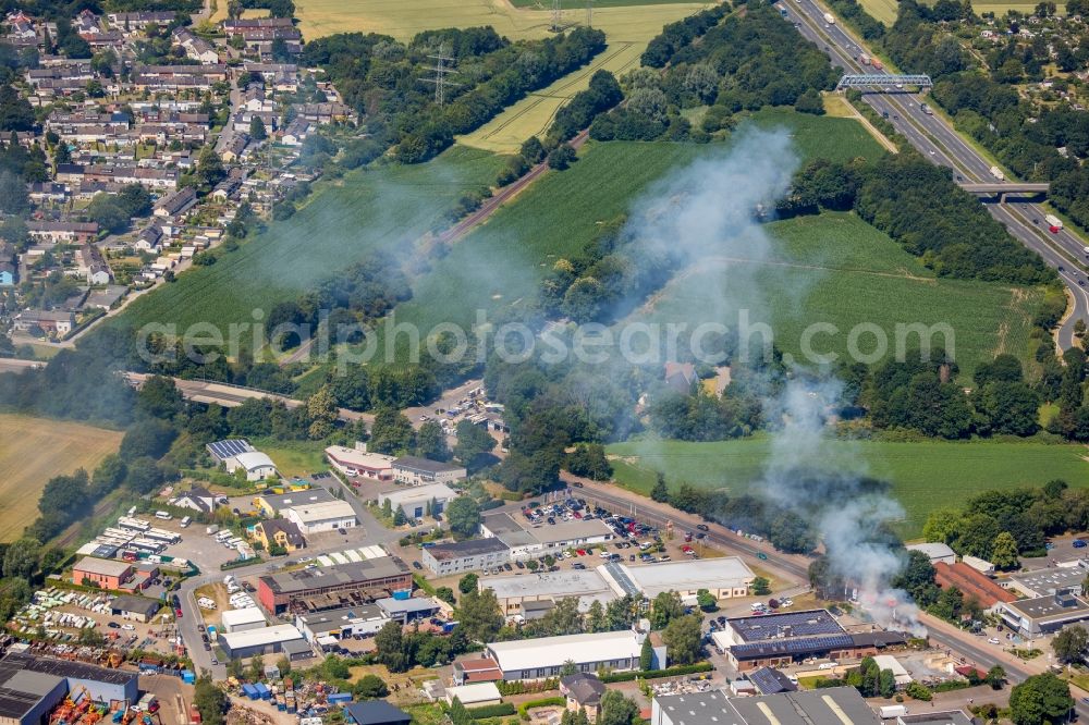 Aerial photograph Gelsenkirchen - Extinguishing work on the hedge of the Gelsenkirchen workshops for customized work Plant 3 in Gelsenkirchen in the state of North Rhine-Westphalia, Germany