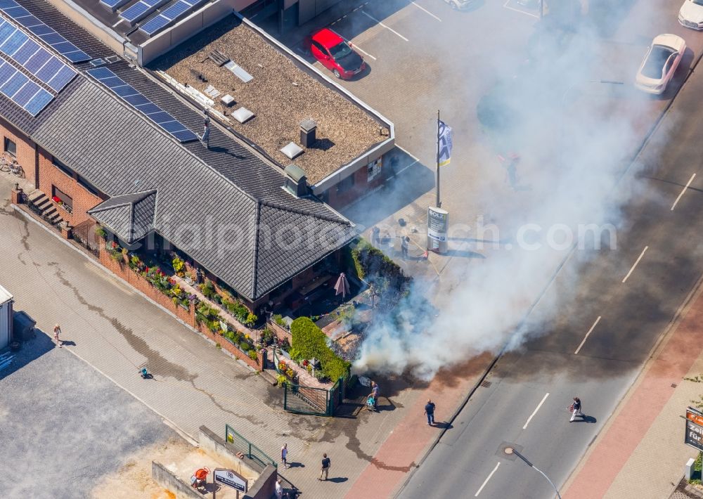 Aerial image Gelsenkirchen - Extinguishing work on the hedge of the Gelsenkirchen workshops for customized work Plant 3 in Gelsenkirchen in the state of North Rhine-Westphalia, Germany