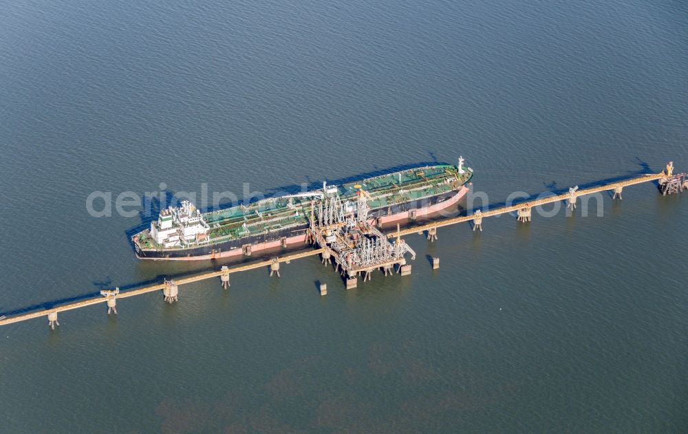 Wilhelmshaven from the bird's eye view: Oil tanker at the pier in Wilhelmshaven in the state of Lower Saxony, Germany