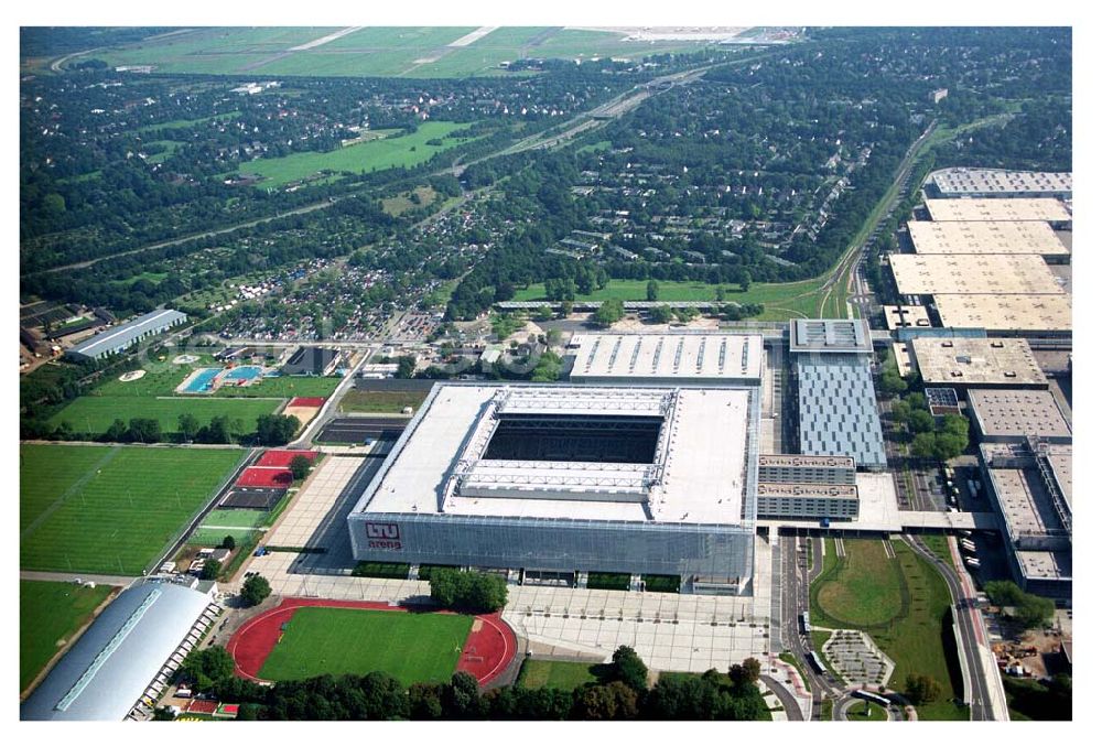 Düsseldorf from the bird's eye view: Blick auf die neu erbaubte LTU Arena heute Esprit Arena in Düsseldorf. Die Arena hat ein gigantisches verschließbares Dach, welches komplett 235 Meter lang und 201 Meter breit ist. Insgesamt verfügt die LTU Arena über 51.500 Sitzplätze und bietet bei Musikkonzerten inklusive Innenraum Platz für bis zu 65.000 Zuschauer. LTU arena, MULTIFUNKTIONSARENA DÜSSELDORF BETRIEBS-GMBH, Liesegangstr. 24, 40211 Düsseldorf, +49 (0) 2 11/20 95 47 -10, +49 (0) 2 11/20 95 47 -11, info@duesseldorf-multifunktionsarena.de