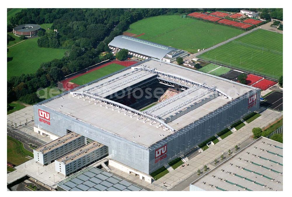 Aerial image Düsseldorf (NRW) - Blick auf die neu erbaubte LTU Arena heute Esprit Arena in Düsseldorf. Die Arena hat ein gigantisches verschließbares Dach, welches komplett 235 Meter lang und 201 Meter breit ist. Insgesamt verfügt die LTU Arena über 51.500 Sitzplätze und bietet bei Musikkonzerten inklusive Innenraum Platz für bis zu 65.000 Zuschauer. LTU arena, MULTIFUNKTIONSARENA DÜSSELDORF BETRIEBS-GMBH, Liesegangstr. 24, 40211 Düsseldorf, +49 (0) 2 11/20 95 47 -10, +49 (0) 2 11/20 95 47 -11, info@duesseldorf-multifunktionsarena.de