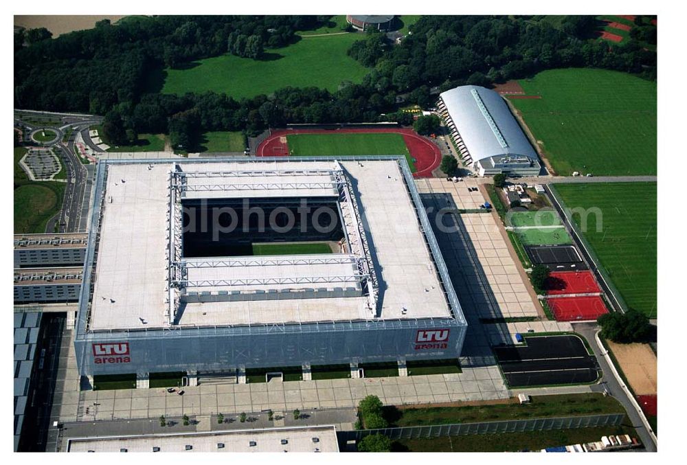 Aerial photograph Düsseldorf (NRW) - Blick auf die neu erbaubte LTU Arena heute Esprit Arena in Düsseldorf. Die Arena hat ein gigantisches verschließbares Dach, welches komplett 235 Meter lang und 201 Meter breit ist. Insgesamt verfügt die LTU Arena über 51.500 Sitzplätze und bietet bei Musikkonzerten inklusive Innenraum Platz für bis zu 65.000 Zuschauer. LTU arena, MULTIFUNKTIONSARENA DÜSSELDORF BETRIEBS-GMBH, Liesegangstr. 24, 40211 Düsseldorf, +49 (0) 2 11/20 95 47 -10, +49 (0) 2 11/20 95 47 -11, info@duesseldorf-multifunktionsarena.de