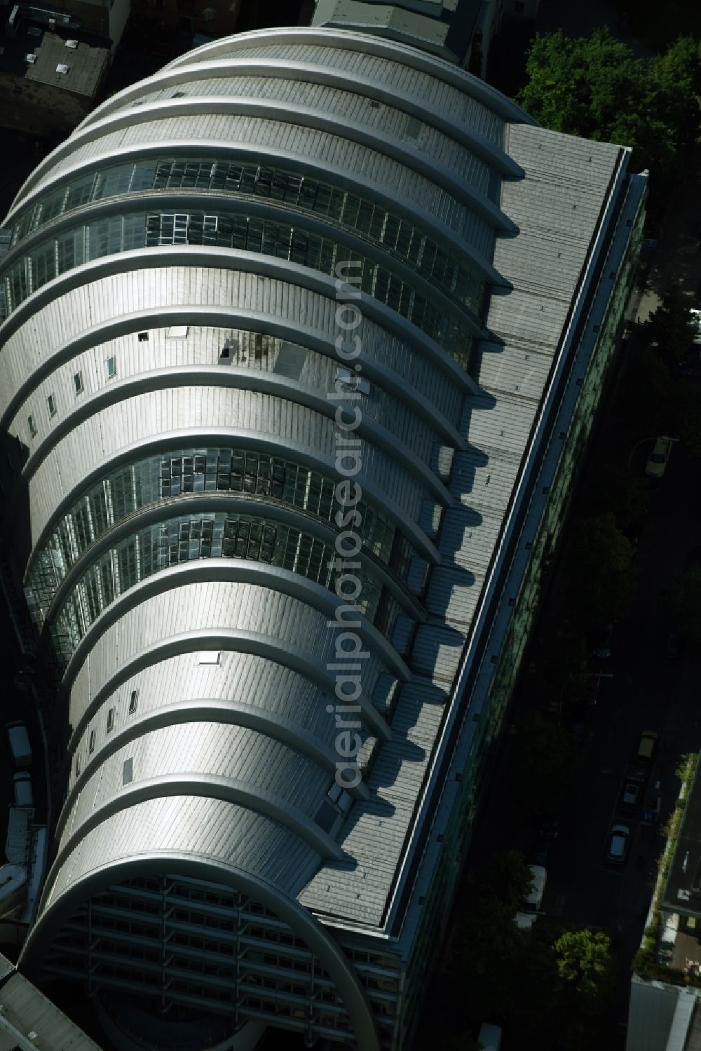 Berlin from the bird's eye view: The Ludwig-Erhard-Haus (commonly known as Armadillo), the seat of the Berlin Stock Exchange and the Chamber of Commerce's (ICC). The building was constructed by Nicholas Grimshaw and Partners. It is located Fasanenstrasse in Berlin's Charlottenburg