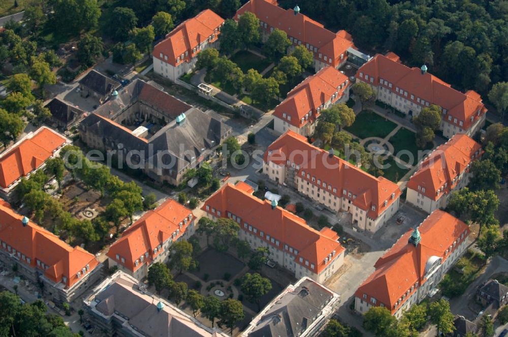 Aerial photograph Berlin - Blick auf den Ludwig Park Wohnen für Generationen mit dem Wasserturm in Buch. Das ehemalige Alte Leute Heim Ludwig Hoffmanns wird durch die LudwigPark Berlin GmbH stufenweise denkmalgerecht saniert. Geplant sind auf dem 100.000 qm großem Grundstück u.a. Wohnungen, betreutes Wohnen, Pflegestationen und ein Hotel.