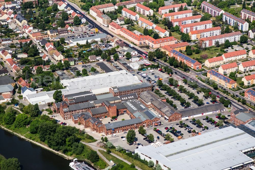 Lutherstadt Wittenberg from the bird's eye view: Building of the construction market of OBI Markt, Daenisches Bettenlager und Moebelmit in Wittenberg on Dessauer Strasse in Lutherstadt Wittenberg in the state Saxony-Anhalt