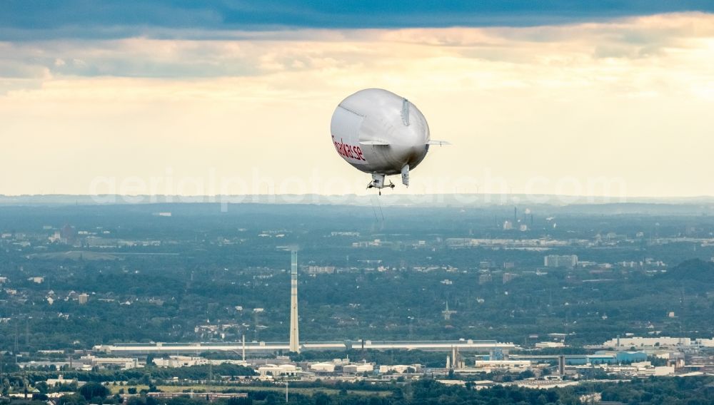 Herne from above - Blimp with Sparkassen- Promotion airship in flight over the airspace in Herne in the state North Rhine-Westphalia