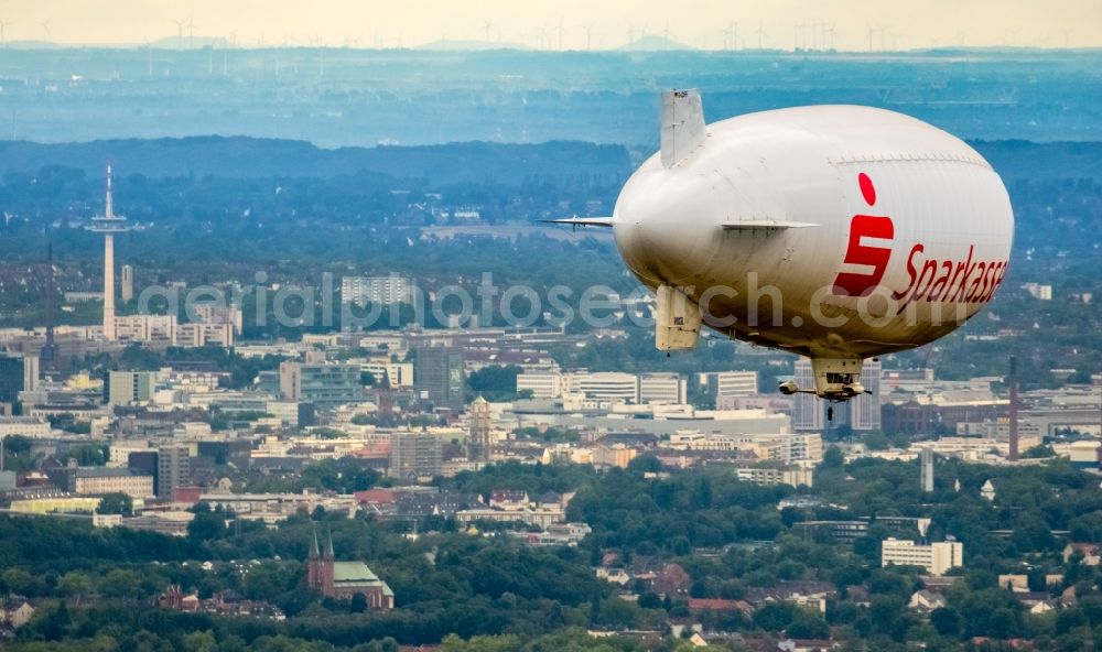 Aerial image Herne - Blimp with Sparkassen- Promotion airship in flight over the airspace in Herne in the state North Rhine-Westphalia