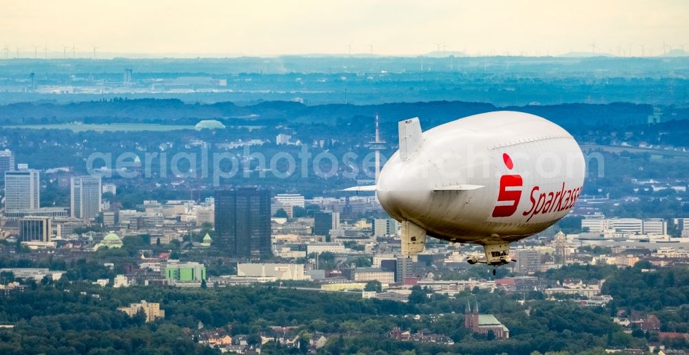 Aerial photograph Herne - Blimp with Sparkassen- Promotion airship in flight over the airspace in Herne in the state North Rhine-Westphalia