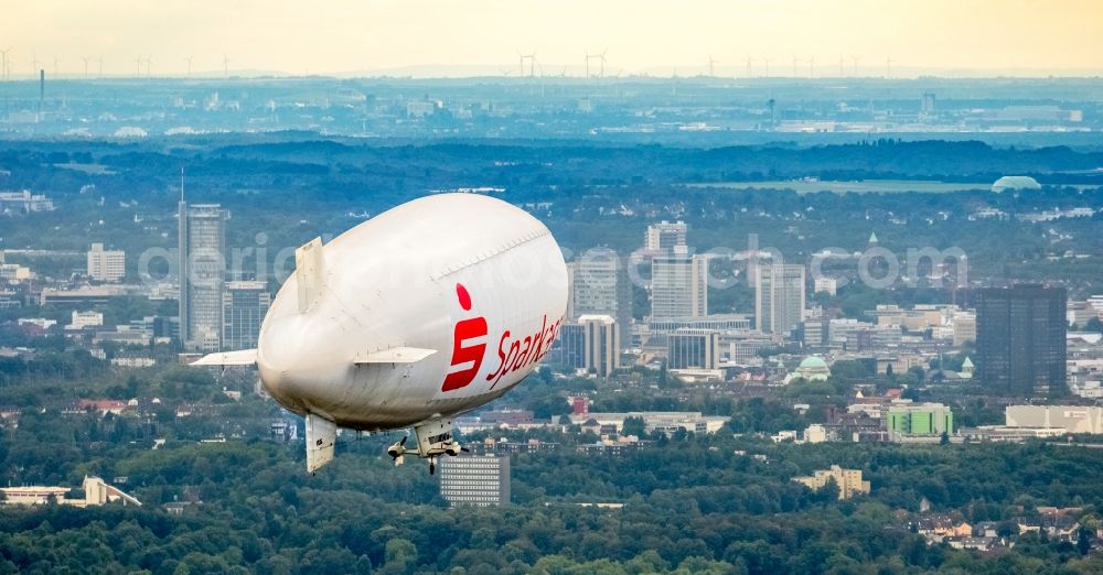 Herne from above - Blimp with Sparkassen- Promotion airship in flight over the airspace in Herne in the state North Rhine-Westphalia