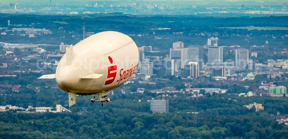 Aerial image Herne - Blimp with Sparkassen- Promotion airship in flight over the airspace in Herne in the state North Rhine-Westphalia