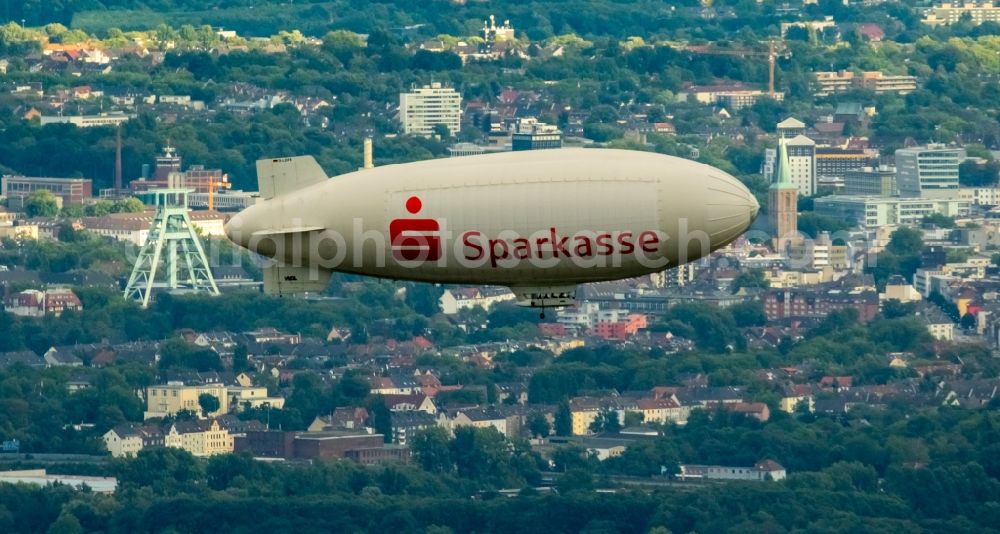 Aerial photograph Bochum - Blimp with Sparkassen - Promotion as airship in flight over the airspace in Bochum in the state North Rhine-Westphalia