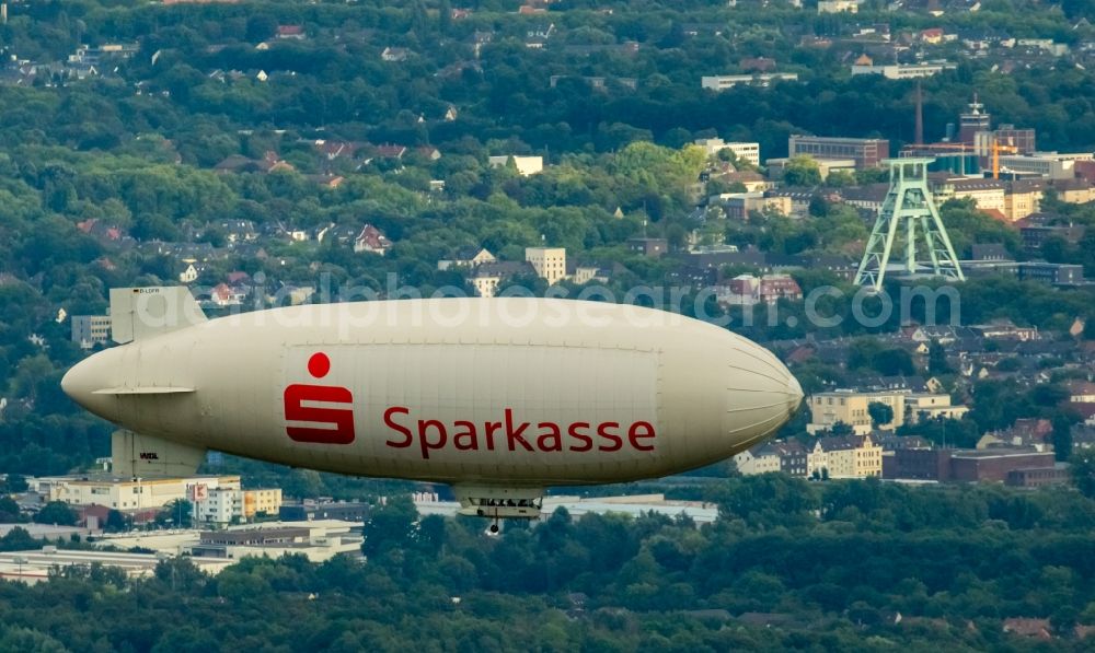 Bochum from above - Blimp with Sparkassen - Promotion as airship in flight over the airspace in Bochum in the state North Rhine-Westphalia