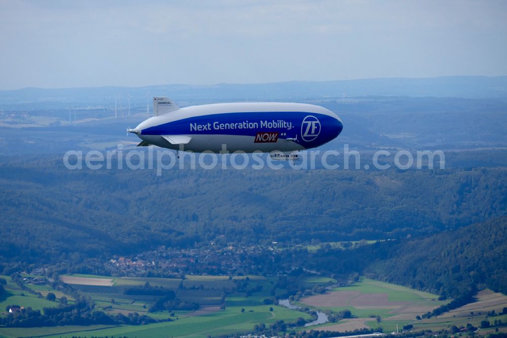 Wesertal from above - Airship D-LZNT in flight over the airspace on street L763 in Wesertal in the state Hesse, Germany