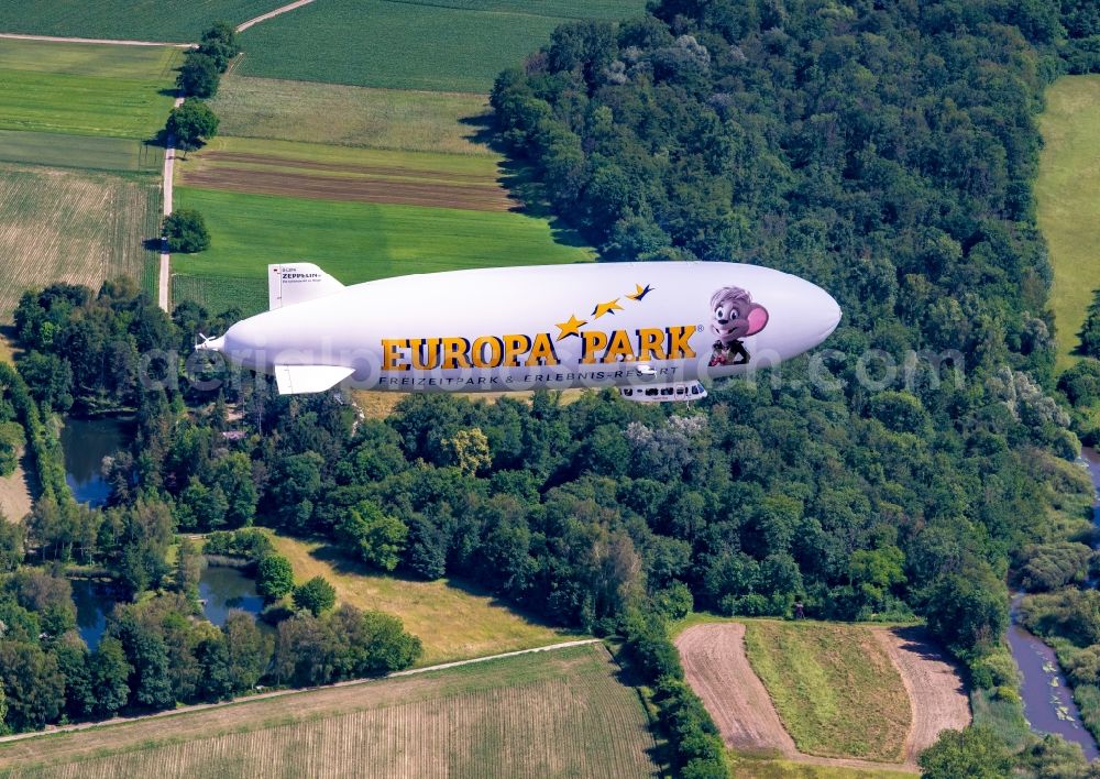 Aerial photograph Rheinau - Airship Zeppelin NT beim Europa-Park in flight over the airspace in Rheinau in the state Baden-Wuerttemberg, Germany