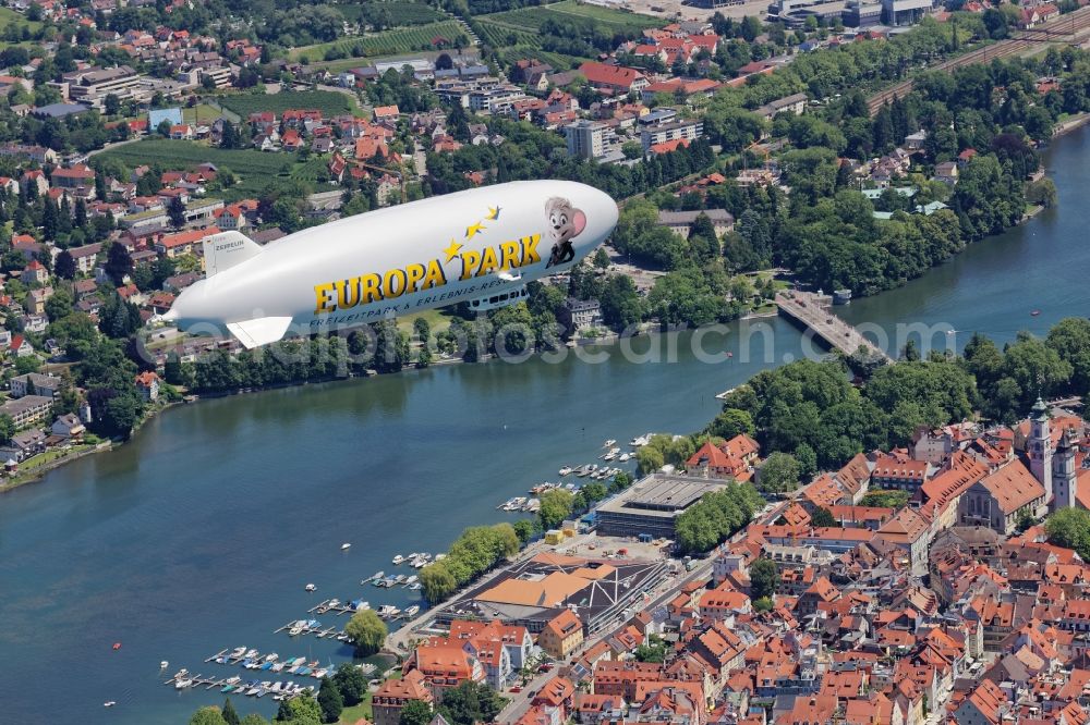 Aerial photograph Lindau (Bodensee) - Zeppelin NT on the island of Lindau in Bavaria. The semi-rigid airship D-LZFN Friedrichshafen on a tourist flight with passengers