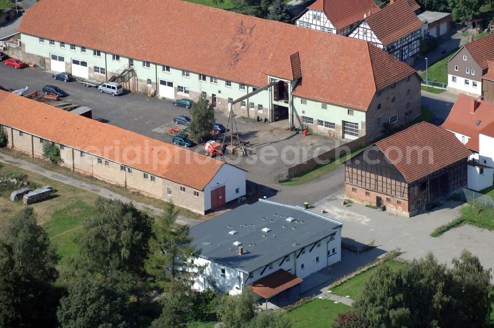 Aerial photograph Madelungen - Blick auf dasLandhotel Zur alten Schrotmühle, dem Quartier der EUROVIA an der Max-Kürschner-Strasse / im Dorfe in Madelungen / Türingen im Rahmen der Neubauarbeiten BAB A4 .