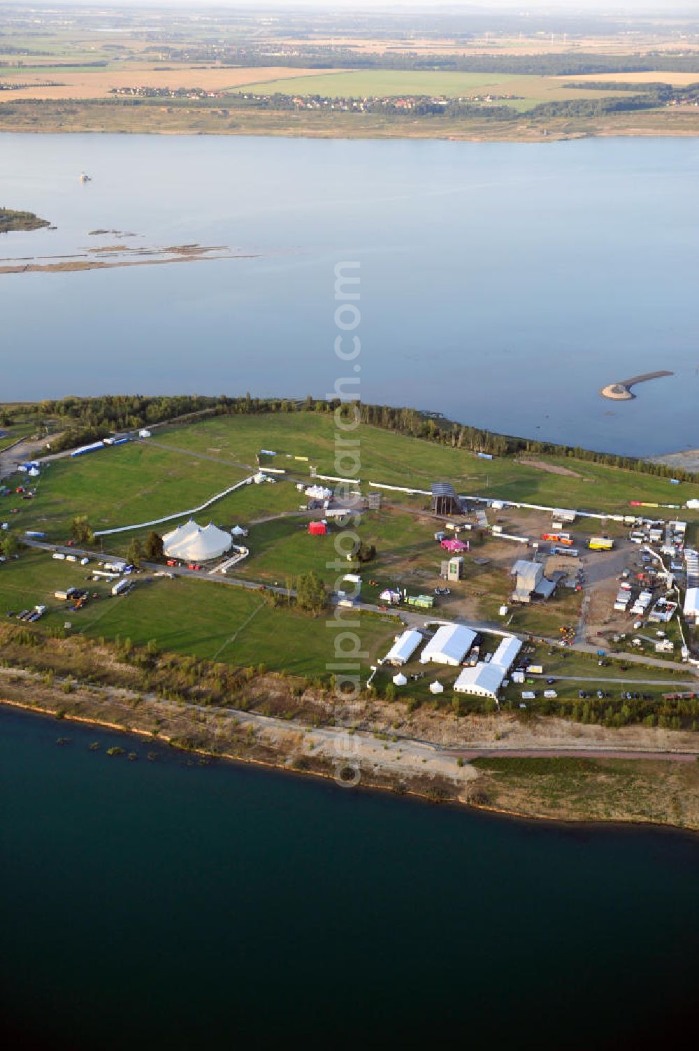 Großpösna from above - Auf dem Gelände des ehemaligen Braunkohle Tagebaus Espenhain in Sachsen enstanden der Störmthaler See und die Magdeborner Halbinsel, auf der unter an derem das Highfield-Festival stattfindet. Der ehemalige Tagebau wurde am 13. September 2003 geflutet. The former opencast mining Espenhain in Saxony turned into a lake and a peninsula called Magdeborner Halbinsel on which fastivals take place. It is situated near Großpoesna.