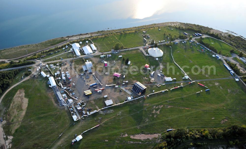 Großpösna from above - Auf dem Gelände des ehemaligen Braunkohle Tagebaus Espenhain in Sachsen enstanden der Störmthaler See und die Magdeborner Halbinsel, auf der unter an derem das Highfield-Festival stattfindet. Der ehemalige Tagebau wurde am 13. September 2003 geflutet. The former opencast mining Espenhain in Saxony turned into a lake and a peninsula called Magdeborner Halbinsel on which fastivals take place. It is situated near Großpoesna.