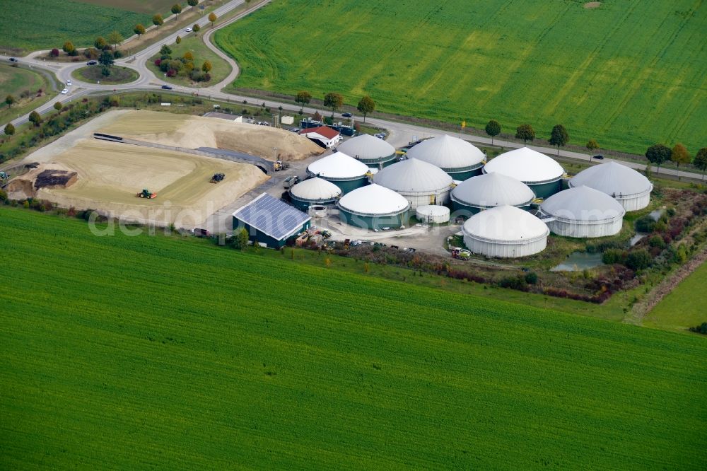 Aerial photograph Rosdorf - Maize crop on a grain storage and storage area of an agricultural in Rosdorf in the state Lower Saxony, Germany