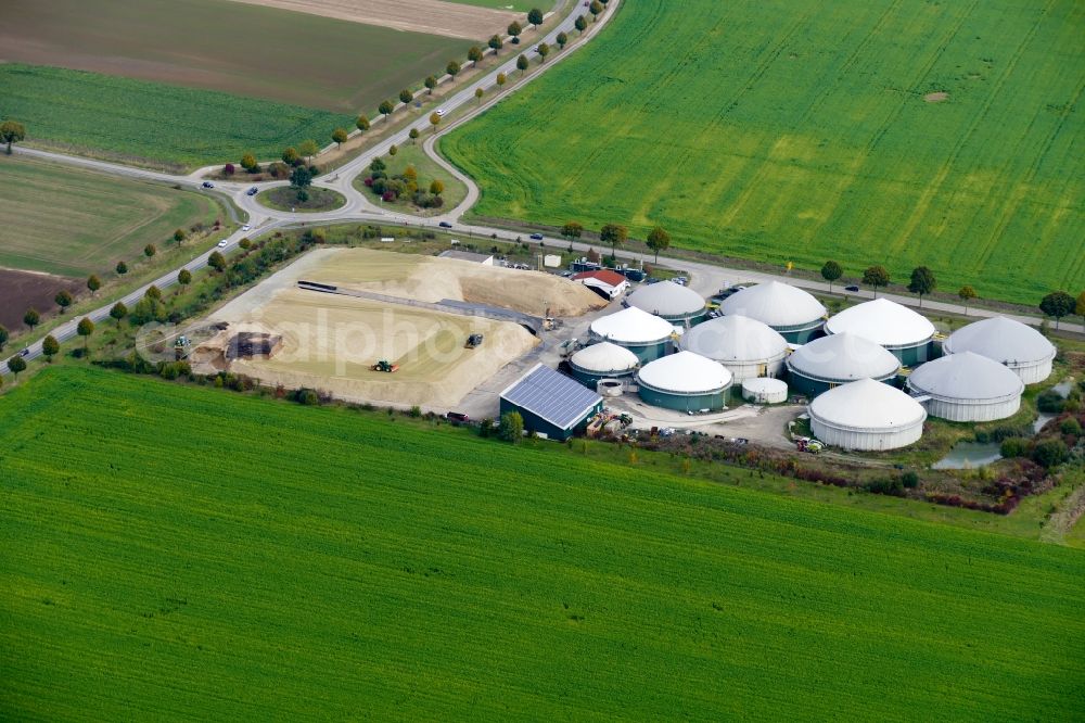 Rosdorf from above - Maize crop on a grain storage and storage area of an agricultural in Rosdorf in the state Lower Saxony, Germany