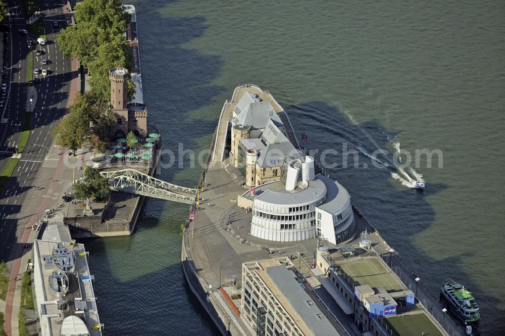 Köln from above - Blick auf den Malakow-Turm (links) und das Imhoff-Schokoladenmuseum am Rheinauhafen. Das Museum wurde 1993 als Imhoff-Stollwerck Schokoladenmuseum eröffnet. View of the Malakoff Tower (left) and the Imhoff-chocolate museum at Rheinauhafen. The museum was opened in 1993 as the Imhoff-Stollwerck chocolate museum.