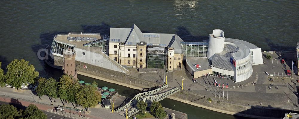 Köln from the bird's eye view: Blick auf den Malakow-Turm (links) und das Imhoff-Schokoladenmuseum am Rheinauhafen. Das Museum wurde 1993 als Imhoff-Stollwerck Schokoladenmuseum eröffnet. View of the Malakoff Tower (left) and the Imhoff-chocolate museum at Rheinauhafen. The museum was opened in 1993 as the Imhoff-Stollwerck chocolate museum.