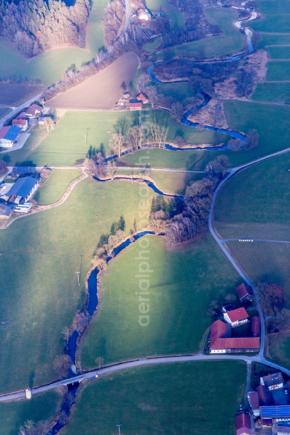 Aerial photograph Triftern - Curved loop of the riparian zones on the course of the river Haselbach in Triftern in the state Bavaria, Germany