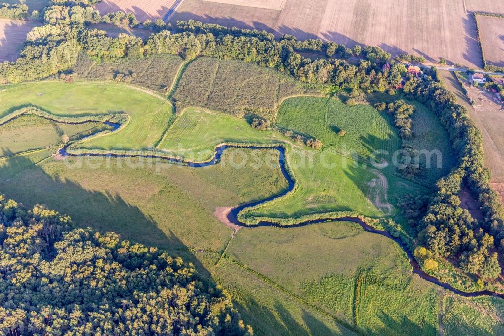 Bengerstorf from the bird's eye view: Curved loop of the riparian zones on the course of the river of Schaale in Bengerstorf in the state Mecklenburg - Western Pomerania, Germany