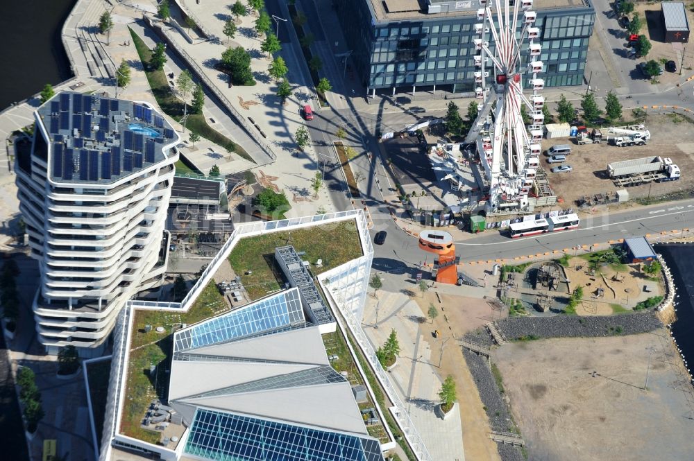 Aerial photograph Hamburg - View of the Marco-Polo-Tower and the German headquarters of Unilever in Hamburg-HafenCity. The 2009 and 2010 completed buildings are the first of many projects at the Strandkai, a partial area of the HafenCity and were designed by the Stuttgart architects Behnisch Architekten