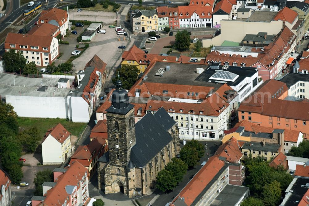 Aerial photograph Gotha - Protestant Margarethe Church on Neumarkt square in the historical city center of Gotha in Thuringia. The late Gothic hall church received its Baroque spire later. The great representative building goes back to the city's importance in the Middle Ages. Gotha was located on the Via Regia