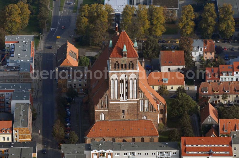 Greifswald from the bird's eye view: Blick auf die Marienkirche. Die Einwohner Greifswald nennen St. Marien liebevoll die dicke Marie aufgrund ihrer gedrungenen und massiven baulichen Anlage. Kontakt: Pfarramt St. Marien I - Pfr. Torsten Kiefer, Friedrich-Loeffler-Straße 67, 17489 Greifswald - Tel. (0 38 34) 20 05 - st.marien.1@kirchenkreis-greifswald.de