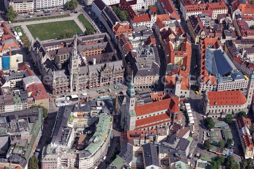 München from above - Ensemble around Marienplatz in the inner city center in Munich in the state Bavaria. In the picture the monument-protected ensemble: New Town Hall between Marienplatz and Marienhof in the pedestrian zone, old town hall, churches Saint Peter and Holy Spirit, Viktualienmarkt