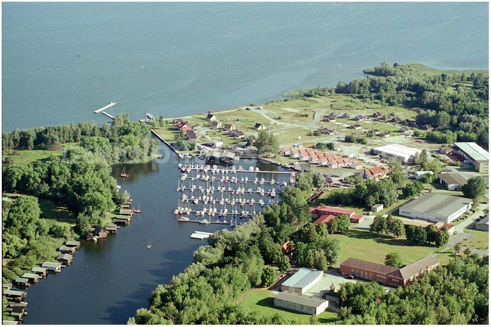 Aerial image Rechlin - 15.08.2004, Die Marina Claassee in Rechlin liegt in einem der schönsten Wassersport-Reviere Deutschlands, dabei ist sie nur an derthalb Autostunden von Berlin und gute zwei Stunden von Hamburg entfernt. Hier finden Segler alle wichtigen Dienstleistungen und Einkaufsangebote ­ in ebenso geschützter wie idyllischer Umgebung. Das Marinagelände befindet sich zwischen Claassee und Müritz-Nationalpark und gehört zum Ort Rechlin.