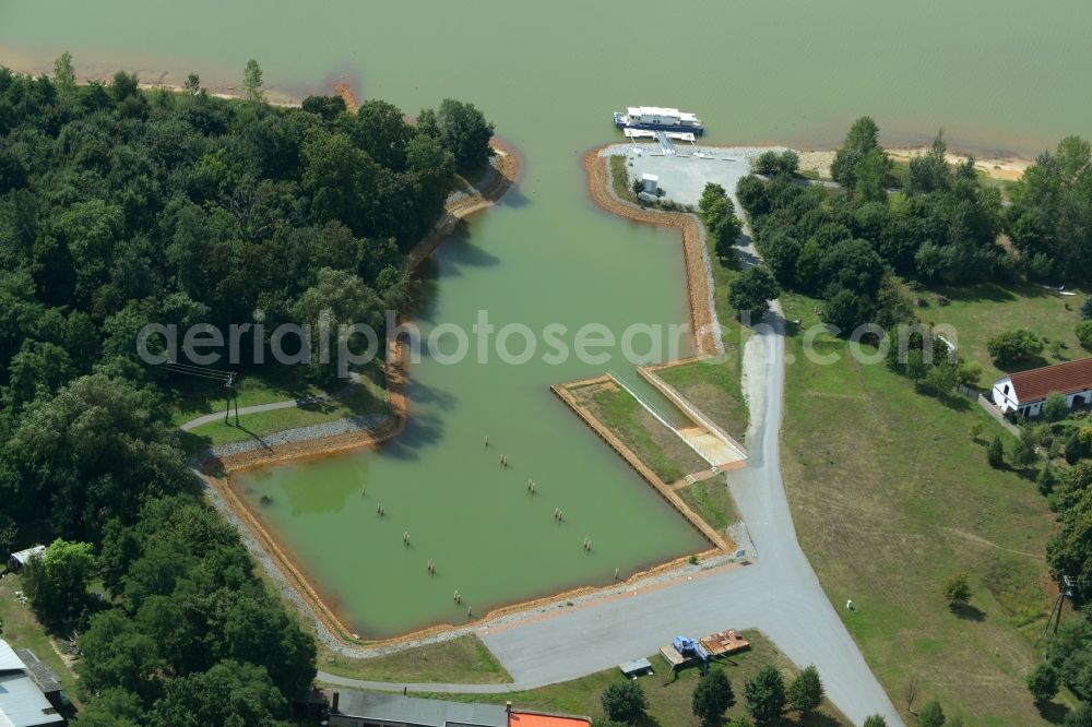 Aerial photograph Schlabendorf am See - Marina of Schlabendorf am See in the state of Brandenburg. The harbour is located in the West of the village and the Northeast of the lake