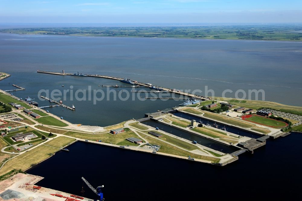 Wilhelmshaven from the bird's eye view: Naval port and sea lock on the North Sea coast of Lower Saxony Wilhelmshaven