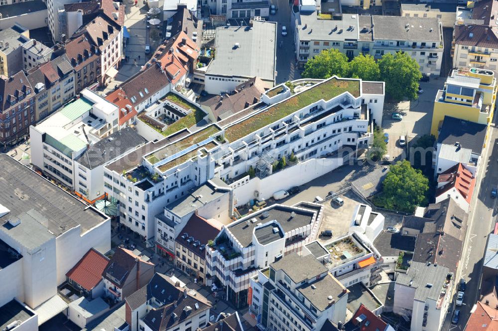 Aerial image Kaiserslautern - The eye-catching building in Kerst street in kaiserslautern has a leafy roof and houses flats and retail shops