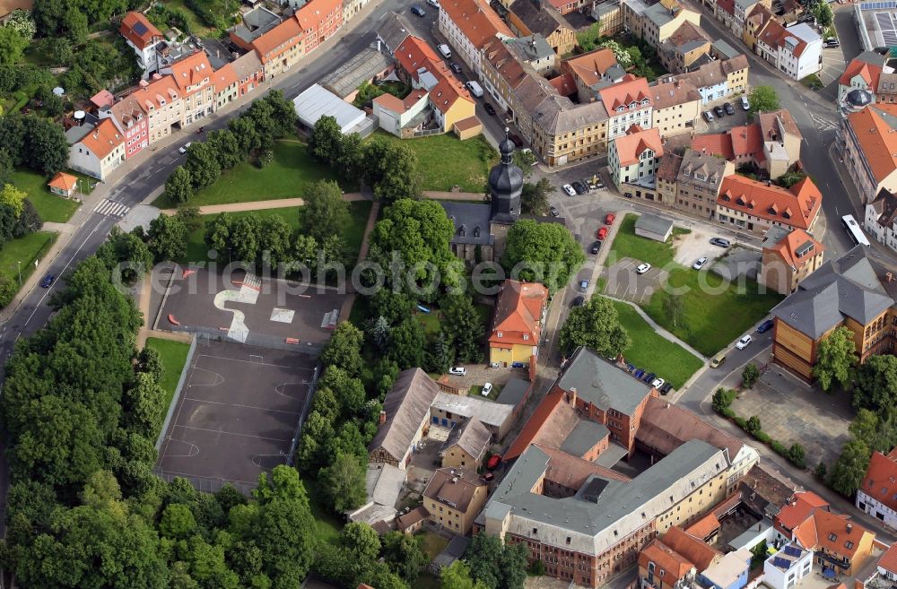 Aerial image Apolda - At Martin Place in Apolda in Thuringia is the Protestant church of St. Martin. The old church, which combines elements from the Romanesque and Gothic formerly stood at the gates of the city. On the square square next to the church there is a skate park and a sports field