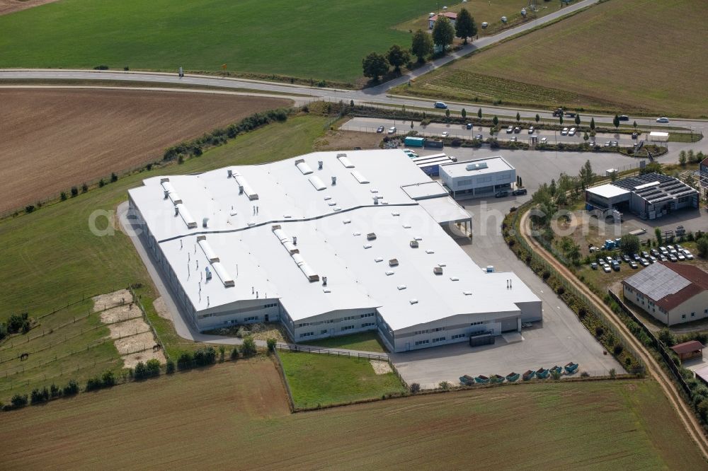 Aerial photograph Rottenburg an der Laaber - Buildings and production halls on the site of the mechanical engineering company Roetzer Maschinenbau GmbH on Landshuter Strasse in Rottenburg an der Laaber in the state Bavaria, Germany