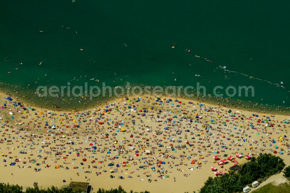 Haltern am See from above - Mass influx of bathers on the beach and the shore areas of the lake Silbersee II in the district Sythen in Haltern am See in the state North Rhine-Westphalia, Germany