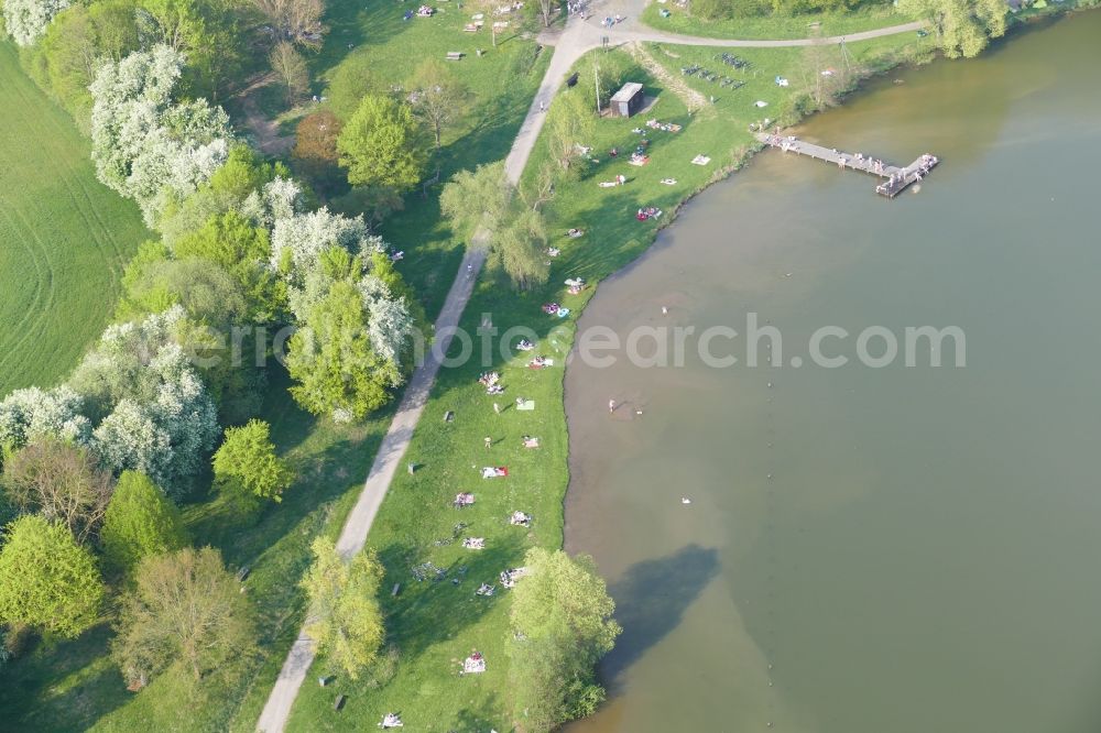 Friedland from above - Mass influx of bathers on the beach and the shore areas of the lake Wendebachstausee in Friedland in the state Lower Saxony, Germany