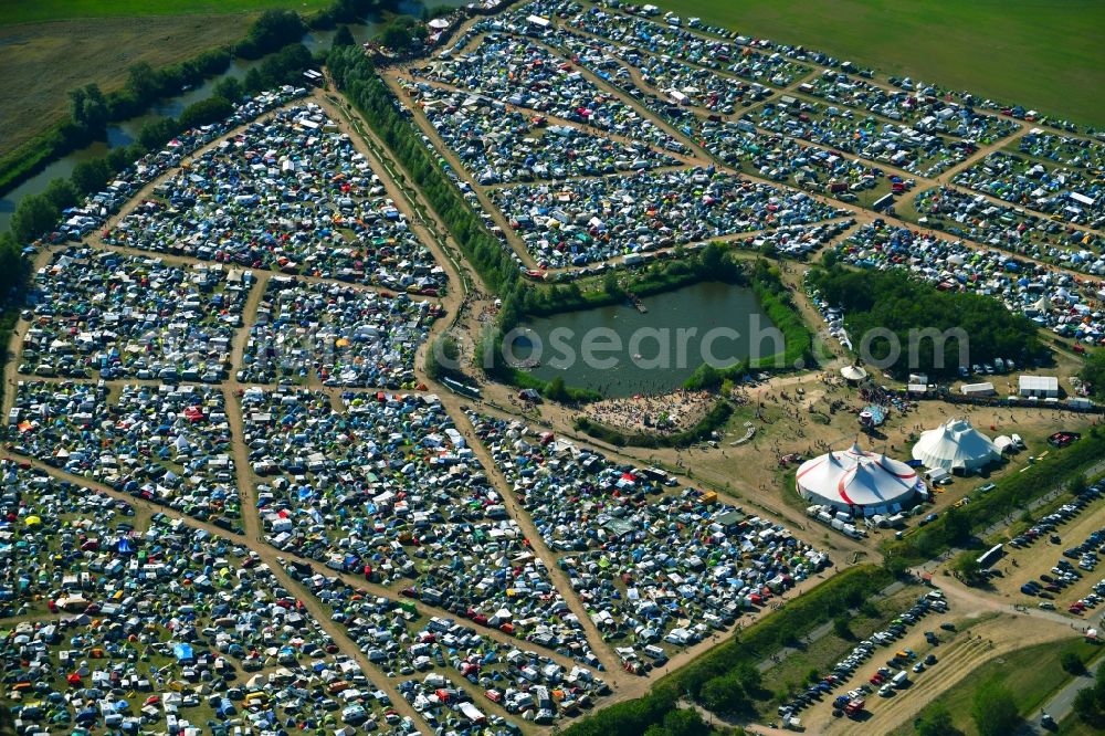 Lärz from the bird's eye view: Crowd of visitors to the Fusion Festival at the airfield Laerz - Rechlin in Laerz in Mecklenburg-Vorpommern, Germany