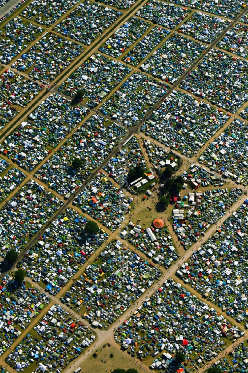 Lärz from above - Crowd of visitors to the Fusion Festival at the airfield Laerz - Rechlin in Laerz in Mecklenburg-Vorpommern, Germany